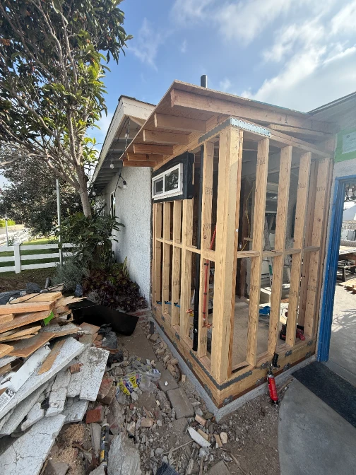 Bathroom addition in Gardena exterior wall framing with vent stack